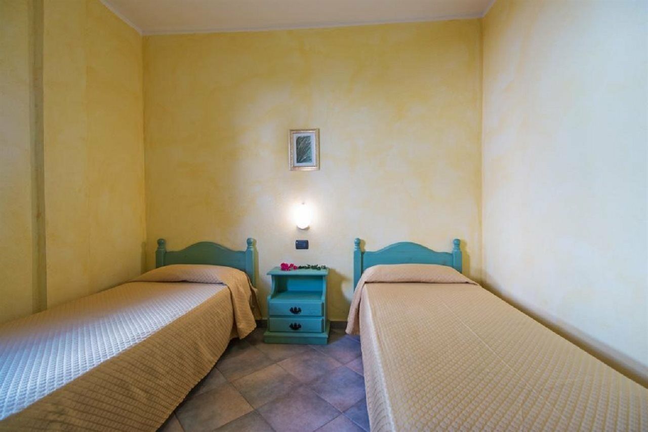 Albergo Residenziale Gli Ontani Cala Liberotto Bagian luar foto