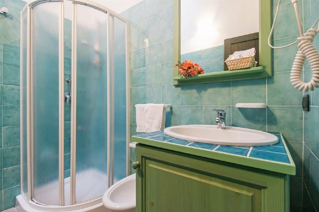 Albergo Residenziale Gli Ontani Cala Liberotto Bagian luar foto